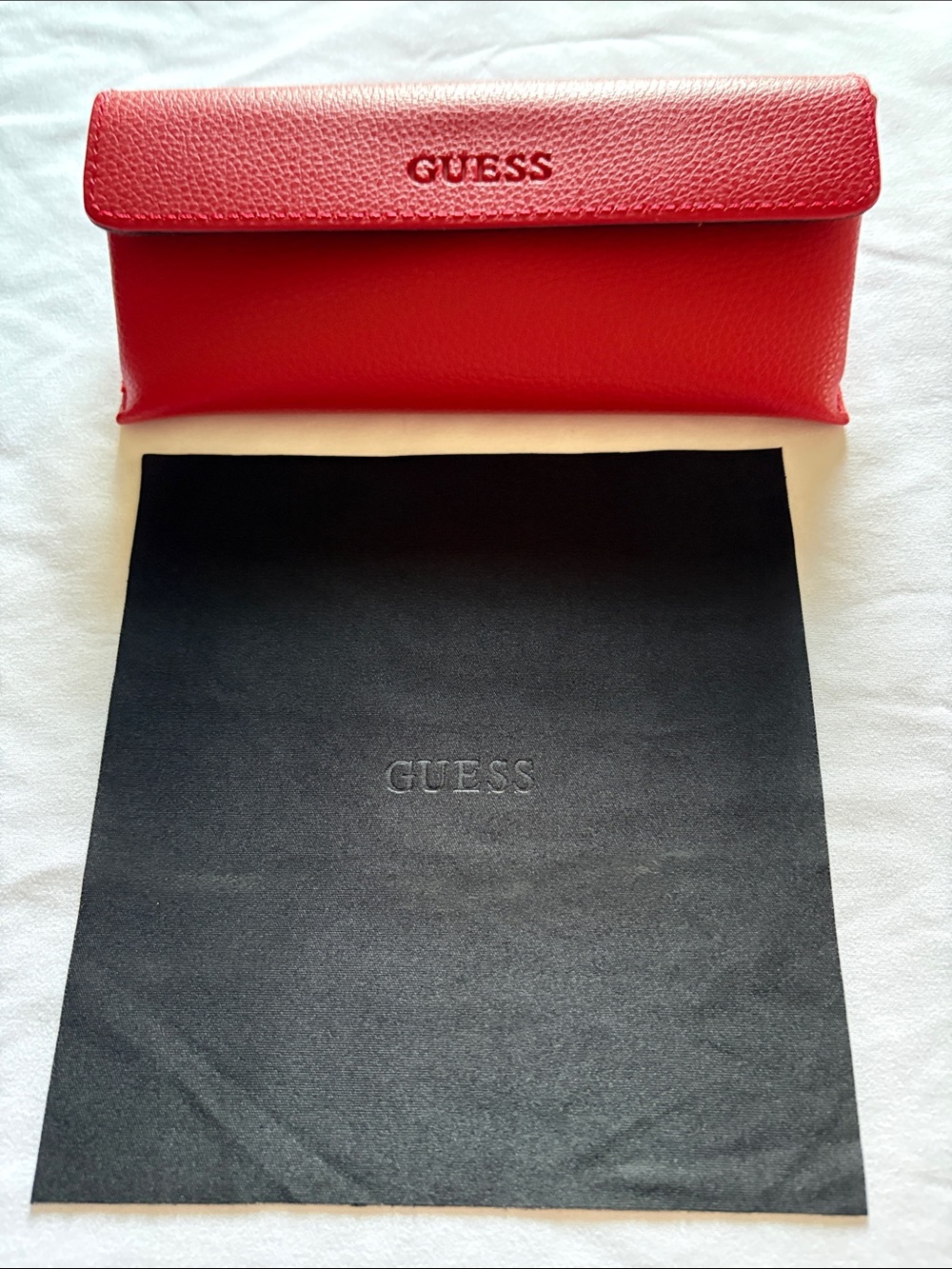Guess Red Pebbled Faux Leather Glasses Case and Black Cleaning Cloth